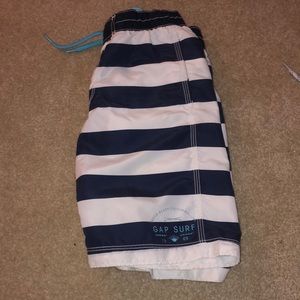 Blue and white striped boys baiting suit
